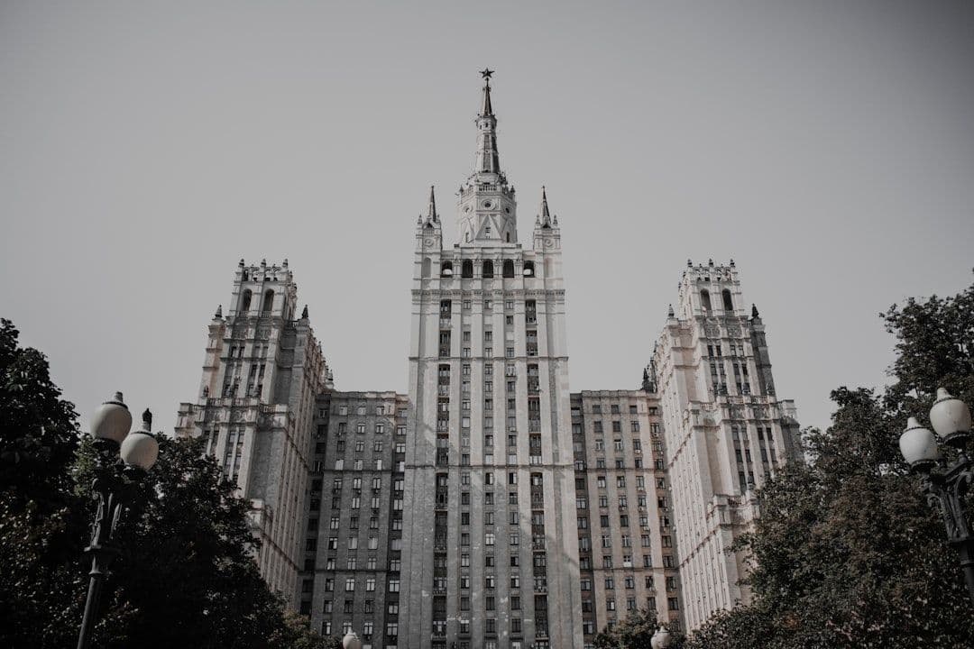 a very tall building with a clock on it's side